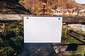 white signpost against a watery background, mockup