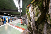 View down corridor to subway platform