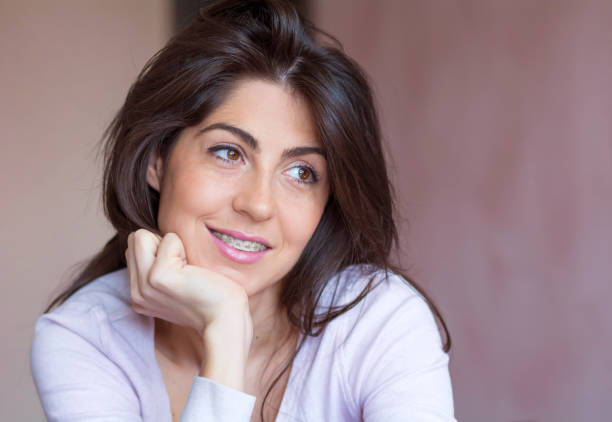 istock Beautiful Woman with Dental  Braces 1995653390