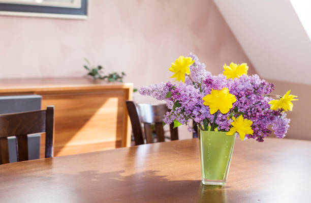 istock Yellow Narcissus and Lilac bouquet 1995653957
