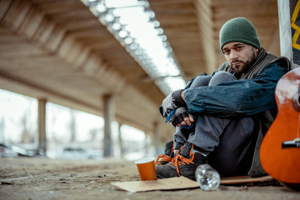 istock Homeless Man in His 40s Looking at Camera 1995709091