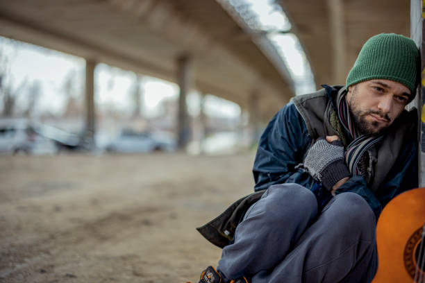 istock Despair Homeless Man Under the Bridge 1995712724