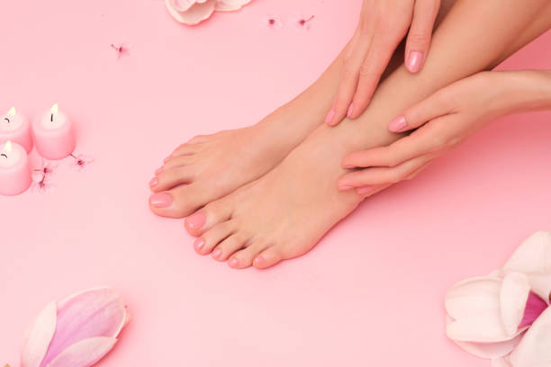 istock Female legs and hands. 1995792846