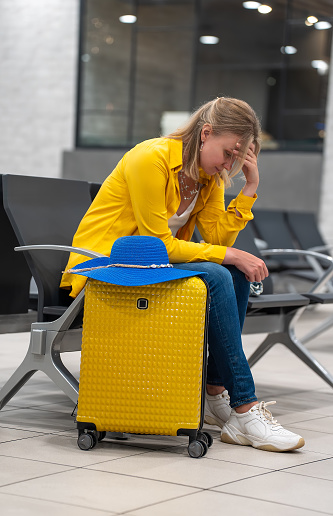 Woman missed her flight or it was cancelled.