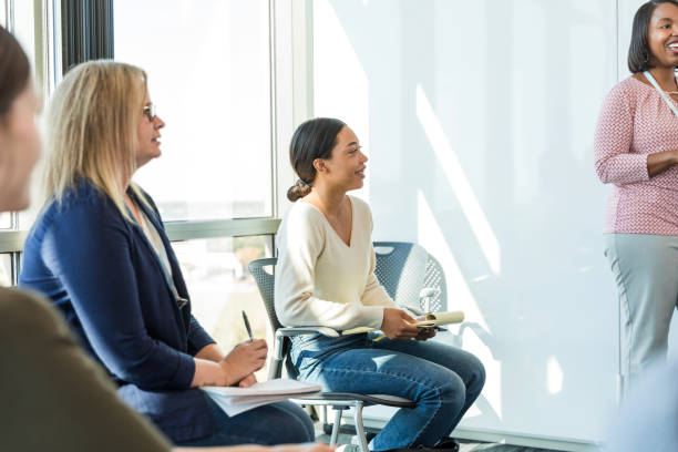 istock Diverse businesswomen attend seminar 1995828798