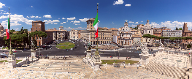 Panoramic scenic view of Piazza Venezia from the top of the hill on a sunny day. Rome. Italy.