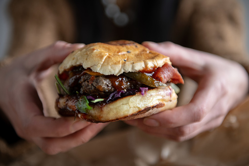 Burger in hands