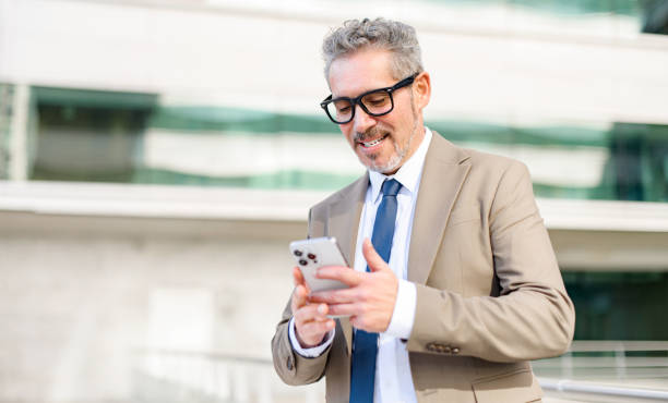 istock High-skilled senior businessman in formal suit 1995864002