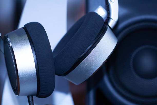 istock modern gray external headphones and music speaker 1995892296