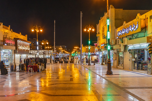 Middle East, Saudi Arabia, Tabuk Province, Tayma. November 15, 2023. Night view of outdoor shopping mall in Tayma. November 15, 2023.