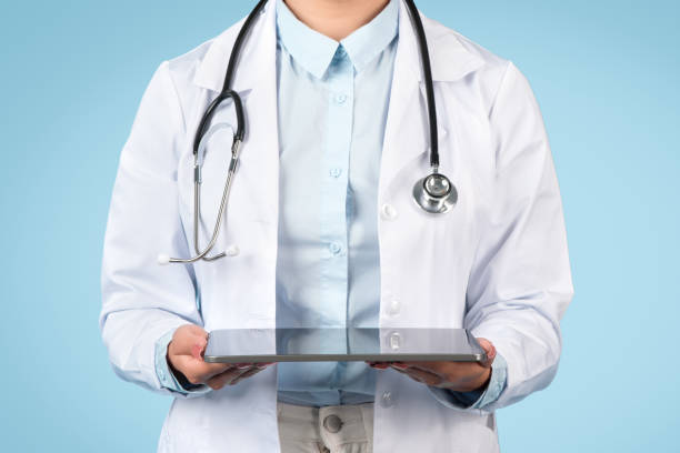 istock Healthcare professional holding digital tablet 1995923737