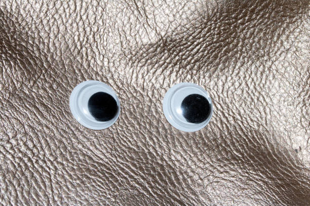 A Funny Wiggle Google Eyes on Fabric Silly Background
