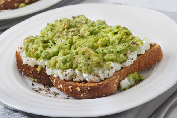 istock Cottage Cheese Toast with Creamy Avocado 1995945232