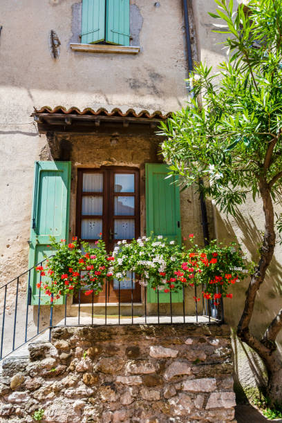 istock Traditional italian house with green plants 1995975585