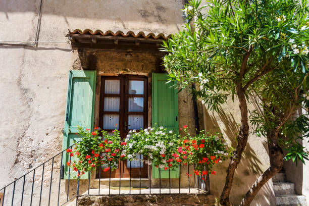 istock Traditional italian house with green plants 1995975607