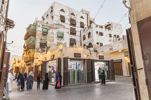 Middle East, Saudi Arabia, Mecca Province, Jeddah. November 21, 2023. Shops on a street in the Al-Balad historical district.
