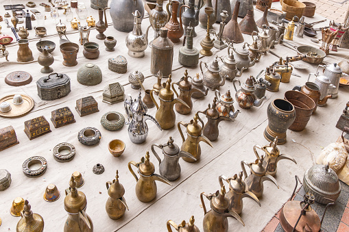 Middle East, Saudi Arabia, Riyadh, Al-Dirah. Traditional brass and brass coffee and tea pots at the Souq Al-Zal.