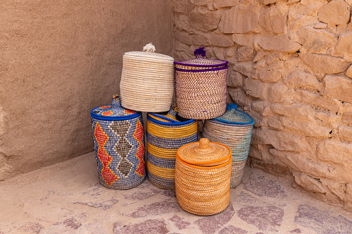 Middle East, Saudi Arabia, Medina, Al-Ula. Colorful baskets in old town Al-Ula.