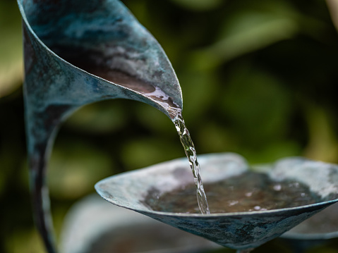 copper decorative fountain in the garden