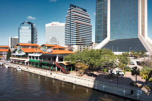 Downtown waterfront with shopping/dining complex and office buildings in Jacksonville, Florida, USA.