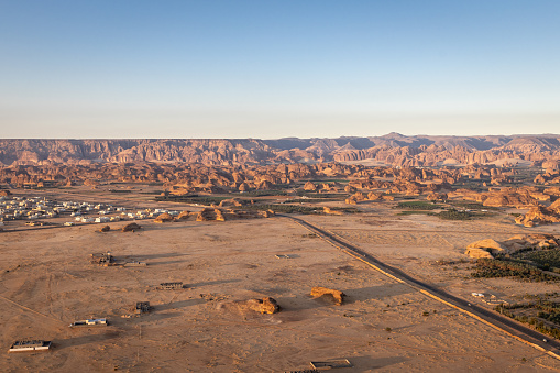 Middle East, Saudi Arabia, Medina, Al-Ula. Highway in the Saudi Arabian desert, seen from a hot air balloon.