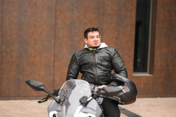 istock young man sitting on racing motorcycle 1996091497