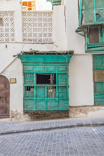 Middle East, Saudi Arabia, Mecca, Jeddah, Al-Balad. Traditional Hijazi tower house with wooden Rosan windows and balconies.