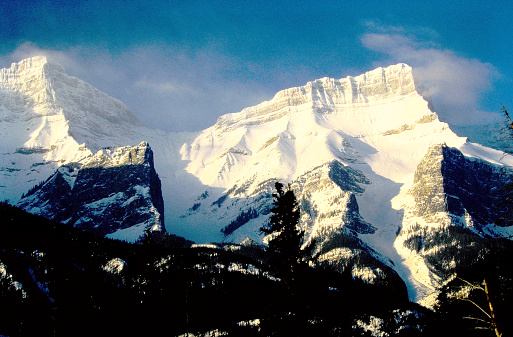 The Rocky Mountains in 1996. From old film stock.