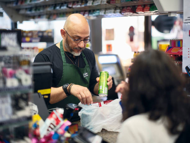 istock Young Couple Shopping in a Convenience Store 1996140595