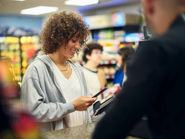istock Young Couple Shopping in a Convenience Store 1996148897