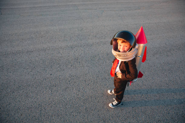 istock Young Boy Businessman Ready to Fly 1996158601