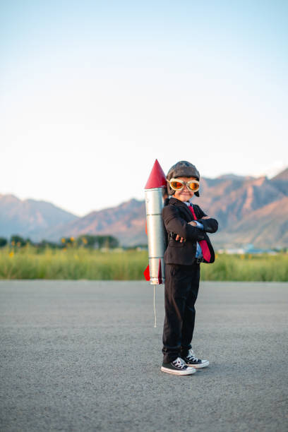 istock Young Boy Businessman Ready to Fly 1996159103
