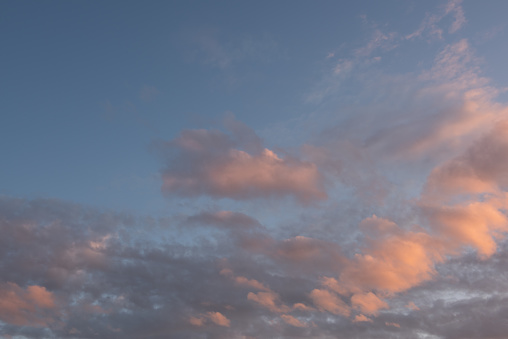 Thunderclouds in the sky in the light of the setting sun