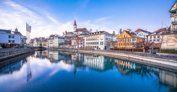 istock Town of Thun and Aare river reflection panoramic view 1996186839
