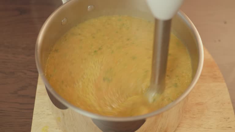 blending carrot and coriander soup