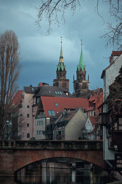 Bridge and beautiful old buildings on the Pegnitz River in Nuremberg. Bavaria Region Middle Franconia, Germany
