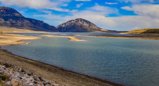 mountain landscape, small lake with clear cold water in a valley among mountains in montana - montana water landscape nature fotografías e imágenes de stock