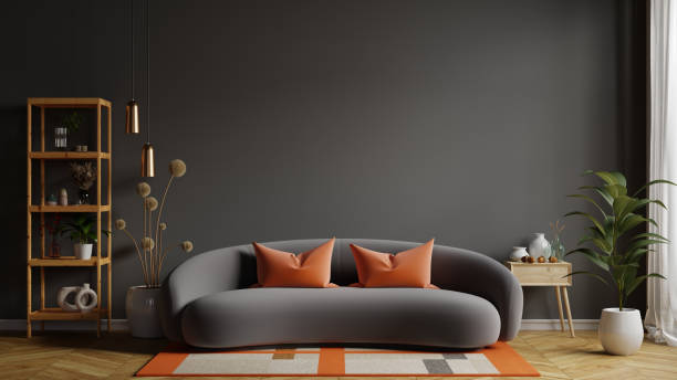 istock Blank empty dark room interior with black sofa and accessories decor 1996396161