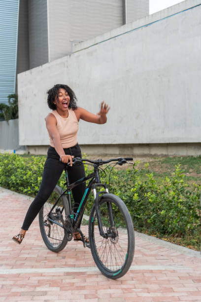 istock Ebullient Biker in City Park 1996409830