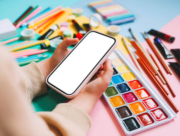 istock A child with a phone in his hands during an online lesson, space for your screenshot 1996410913