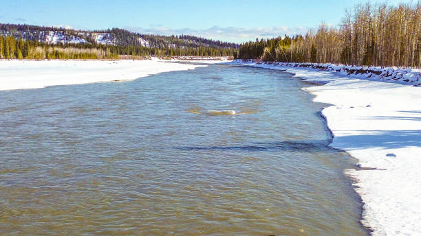 A drone flight over the frosty landscape of Interior Alaska is evidence that colder temperatures have arrived.  The Copper River, once full of spawning salmon, is now entering a time of rest. Ice begins to form on the river as well. On this cold day the river forges on despite the frigid temperatures.