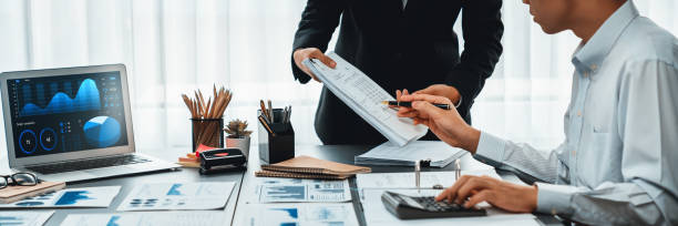 istock Auditor team working in office, analyzing financial data and accounting. Insight 1996437810