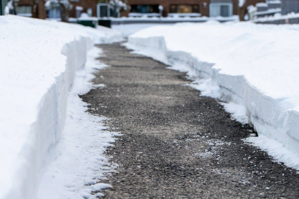 istock Road with salt for melting snow in winter. 1996442026