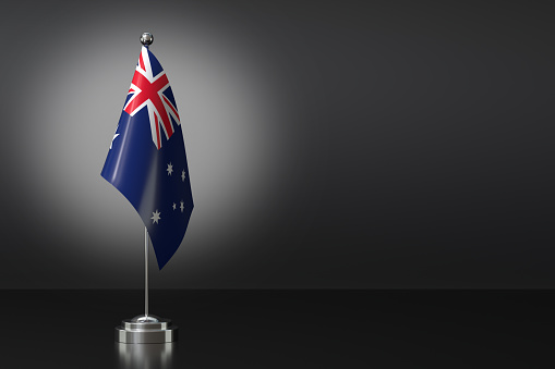 Small National Flag of the Commonwealth of Australia on a Black Background. 3d Rendering