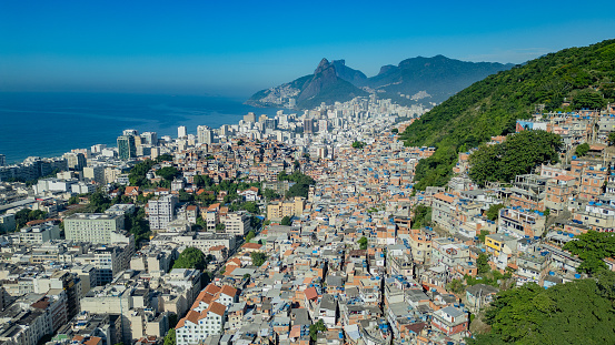 Favela and Ipanema neighborhood in the background