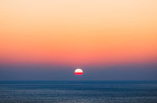 istock Sea sunrise landscape. rising sun 1996546340