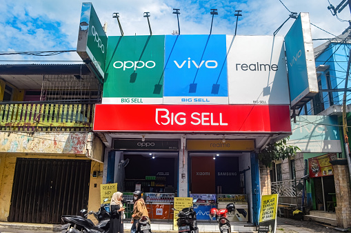 a smartphone or Android cellphone shop that sells Vivo, Oppo and Realme brand products, Indonesia, 5 February 2024