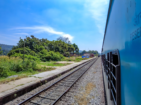 Hubbali, India - January 27 2024: Travelling on a passenger train between Bangalore and Mangalore near Hubbali India.