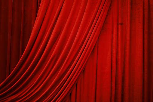 deep red stage curtain, red velvet, background texture with space for text