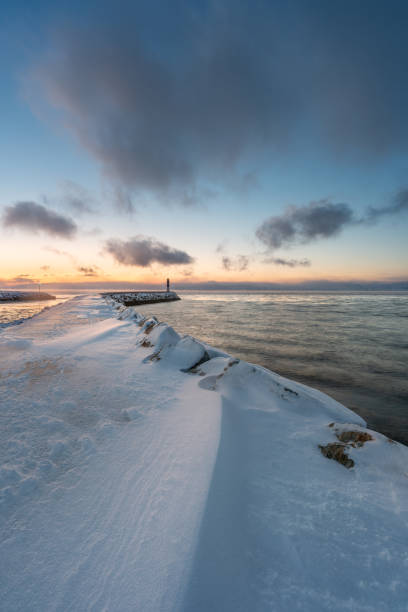 istock A beacon at the end of a breakwater 1996895489